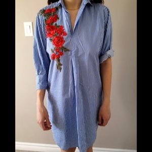 Striped tunic with floral appliqué